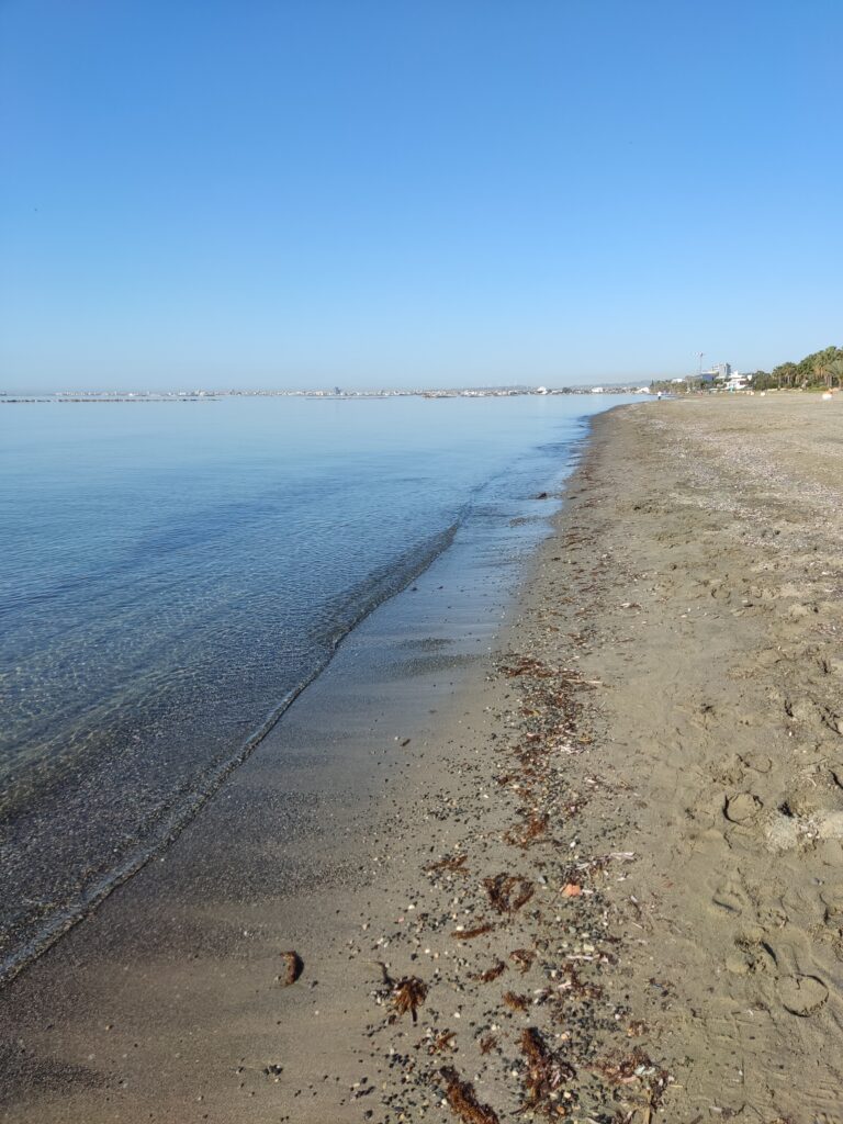 Nefeli beach - sand and shallow water